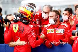 Carlos Sainz Jr (ESP) Ferrari celebrates his third position with the team in parc ferme. 26.09.2021. Formula 1 World Championship, Rd 15, Russian Grand Prix, Sochi Autodrom, Sochi, Russia, Race Day.