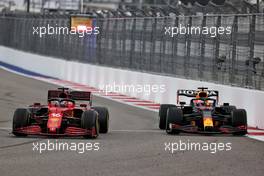 Charles Leclerc (MON) Ferrari SF-21 and Max Verstappen (NLD) Red Bull Racing RB16B battle for position. 26.09.2021. Formula 1 World Championship, Rd 15, Russian Grand Prix, Sochi Autodrom, Sochi, Russia, Race Day.
