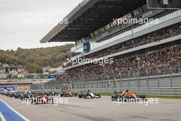Lando Norris (GBR) McLaren MCL35M leads at the start of the race. 26.09.2021. Formula 1 World Championship, Rd 15, Russian Grand Prix, Sochi Autodrom, Sochi, Russia, Race Day.