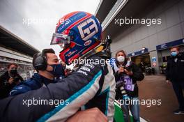 George Russell (GBR) Williams Racing celebrates his third position in qualifying parc ferme. 25.09.2021. Formula 1 World Championship, Rd 15, Russian Grand Prix, Sochi Autodrom, Sochi, Russia, Qualifying Day.