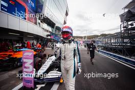 George Russell (GBR) Williams Racing FW43B celebrates his third position in qualifying parc ferme. 25.09.2021. Formula 1 World Championship, Rd 15, Russian Grand Prix, Sochi Autodrom, Sochi, Russia, Qualifying Day.