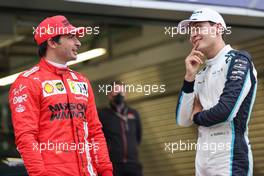 Carlos Sainz Jr (ESP) Ferrari SF-21 and George Russell (GBR) Williams Racing FW43B. 25.09.2021. Formula 1 World Championship, Rd 15, Russian Grand Prix, Sochi Autodrom, Sochi, Russia, Qualifying Day.