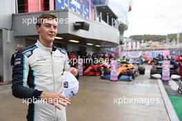 George Russell (GBR) Williams Racing FW43B celebrates 3rd position in qualifying parc ferme. 25.09.2021. Formula 1 World Championship, Rd 15, Russian Grand Prix, Sochi Autodrom, Sochi, Russia, Qualifying Day.