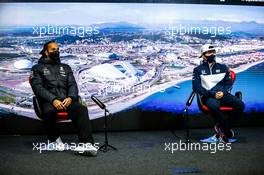 (L to R): Lewis Hamilton (GBR) Mercedes AMG F1 and Yuki Tsunoda (JPN) AlphaTauri in the FIA Press Conference. 23.09.2021. Formula 1 World Championship, Rd 15, Russian Grand Prix, Sochi Autodrom, Sochi, Russia, Preparation Day.
