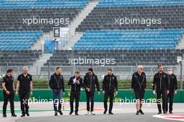 Daniil Kvyat (RUS) Alpine F1 Team Reserve Driver and Esteban Ocon (FRA) Alpine F1 Team walk the circuit with the team. 23.09.2021. Formula 1 World Championship, Rd 15, Russian Grand Prix, Sochi Autodrom, Sochi, Russia, Preparation Day.