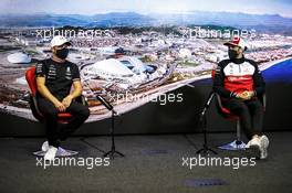 (L to R): Valtteri Bottas (FIN) Mercedes AMG F1 and Antonio Giovinazzi (ITA) Alfa Romeo Racing in the FIA Press Conference. 23.09.2021. Formula 1 World Championship, Rd 15, Russian Grand Prix, Sochi Autodrom, Sochi, Russia, Preparation Day.