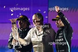 The podium (L to R): Lewis Hamilton (GBR) Mercedes AMG F1, race winner; Ron Meadows (GBR) Mercedes GP Team Manager; Valtteri Bottas (FIN) Mercedes AMG F1, third. 05.12.2021. Formula 1 World Championship, Rd 21, Saudi Arabian Grand Prix, Jeddah, Saudi Arabia, Race Day.