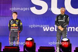 (L to R): Second placed Max Verstappen (NLD) Red Bull Racing and race winner Lewis Hamilton (GBR) Mercedes AMG F1 on the podium. 05.12.2021. Formula 1 World Championship, Rd 21, Saudi Arabian Grand Prix, Jeddah, Saudi Arabia, Race Day.
