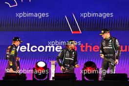 The podium (L to R): Max Verstappen (NLD) Red Bull Racing, second; Lewis Hamilton (GBR) Mercedes AMG F1, race winner; Valtteri Bottas (FIN) Mercedes AMG F1, third. 05.12.2021. Formula 1 World Championship, Rd 21, Saudi Arabian Grand Prix, Jeddah, Saudi Arabia, Race Day.