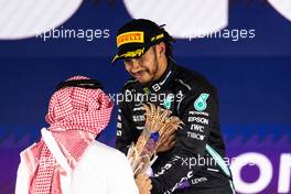 Race winner Lewis Hamilton (GBR) Mercedes AMG F1 celebrates on the podium. 05.12.2021. Formula 1 World Championship, Rd 21, Saudi Arabian Grand Prix, Jeddah, Saudi Arabia, Race Day.