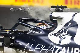 Yuki Tsunoda (JPN) AlphaTauri AT02 after colliding with Sebastian Vettel (GER) Aston Martin F1 Team AMR21. 05.12.2021. Formula 1 World Championship, Rd 21, Saudi Arabian Grand Prix, Jeddah, Saudi Arabia, Race Day.