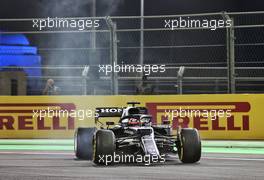 Yuki Tsunoda (JPN) AlphaTauri AT02 after colliding with Sebastian Vettel (GER) Aston Martin F1 Team AMR21. 05.12.2021. Formula 1 World Championship, Rd 21, Saudi Arabian Grand Prix, Jeddah, Saudi Arabia, Race Day.