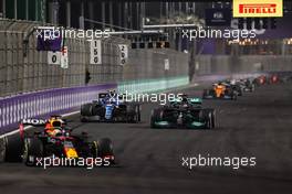 Lewis Hamilton (GBR), Mercedes AMG F1  and Esteban Ocon (FRA), Alpine F1 Team  05.12.2021. Formula 1 World Championship, Rd 21, Saudi Arabian Grand Prix, Jeddah, Saudi Arabia, Race Day.
