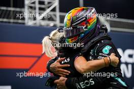 Lewis Hamilton (GBR) Mercedes AMG F1 celebrates his pole position in qualifying parc ferme with Angela Cullen (NZL) Mercedes AMG F1 Physiotherapist. 04.12.2021. Formula 1 World Championship, Rd 21, Saudi Arabian Grand Prix, Jeddah, Saudi Arabia, Qualifying Day.