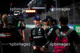 Lewis Hamilton (GBR) Mercedes AMG F1 (Right) celebrates his pole position with second placed team mate Valtteri Bottas (FIN) Mercedes AMG F1 in qualifying parc ferme. 04.12.2021. Formula 1 World Championship, Rd 21, Saudi Arabian Grand Prix, Jeddah, Saudi Arabia, Qualifying Day.