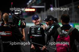 Lewis Hamilton (GBR) Mercedes AMG F1 (Right) celebrates his pole position with second placed team mate Valtteri Bottas (FIN) Mercedes AMG F1 in qualifying parc ferme. 04.12.2021. Formula 1 World Championship, Rd 21, Saudi Arabian Grand Prix, Jeddah, Saudi Arabia, Qualifying Day.