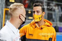 (L to R): Nikita Mazepin (RUS) Haas F1 Team with Daniel Ricciardo (AUS) McLaren. 05.12.2021. Formula 1 World Championship, Rd 21, Saudi Arabian Grand Prix, Jeddah, Saudi Arabia, Race Day.