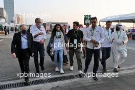 Jean Todt (FRA) FIA President and Stefano Domenicali (ITA) Formula One President and CEO with paddock guests. 02.12.2021. Formula 1 World Championship, Rd 21, Saudi Arabian Grand Prix, Jeddah, Saudi Arabia, Preparation Day.