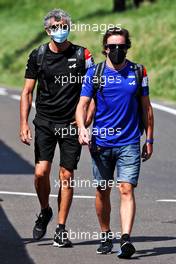 Fernando Alonso (ESP) Alpine F1 Team with Edoardo Bendinelli (ITA) Alpine F1 Team Personal Trainer. 25.06.2021. Formula 1 World Championship, Rd 8, Steiermark Grand Prix, Spielberg, Austria, Practice Day.