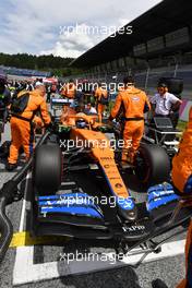 Daniel Ricciardo (AUS) McLaren MCL35M on the grid. 27.06.2021. Formula 1 World Championship, Rd 8, Steiermark Grand Prix, Spielberg, Austria, Race Day.