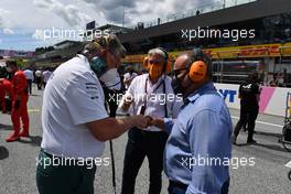 Otmar Szafnauer (USA) Aston Martin F1 Team Principal and CEO (Left) and Crown Prince Shaikh Salman bin Isa Hamad Al Khalifa (BRN) (Right) on the grid. 27.06.2021. Formula 1 World Championship, Rd 8, Steiermark Grand Prix, Spielberg, Austria, Race Day.