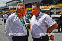 (L to R): Paul Walsh (GBR) McLaren Executive Chairman with Zak Brown (USA) McLaren Executive Director on the grid.  27.06.2021. Formula 1 World Championship, Rd 8, Steiermark Grand Prix, Spielberg, Austria, Race Day.
