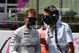 Sebastian Vettel (GER) Aston Martin F1 Team with Tim Wright (GBR) Aston Martin F1 Team Race Engineer on the grid. 27.06.2021. Formula 1 World Championship, Rd 8, Steiermark Grand Prix, Spielberg, Austria, Race Day.