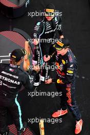 Race winner Max Verstappen (NLD) Red Bull Racing celebrates with third placed Valtteri Bottas (FIN) Mercedes AMG F1 on the podium and second placed Lewis Hamilton (GBR) Mercedes AMG F1 on the podium. 27.06.2021. Formula 1 World Championship, Rd 8, Steiermark Grand Prix, Spielberg, Austria, Race Day.