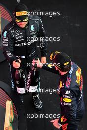 Race winner Max Verstappen (NLD) Red Bull Racing celebrates with third placed Valtteri Bottas (FIN) Mercedes AMG F1 on the podium. 27.06.2021. Formula 1 World Championship, Rd 8, Steiermark Grand Prix, Spielberg, Austria, Race Day.