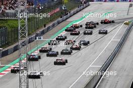 Max Verstappen (NLD) Red Bull Racing RB16B leads at the start of the race. 27.06.2021. Formula 1 World Championship, Rd 8, Steiermark Grand Prix, Spielberg, Austria, Race Day.
