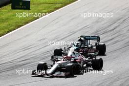 Kimi Raikkonen (FIN) Alfa Romeo Racing C41 and Sebastian Vettel (GER) Aston Martin F1 Team AMR21 battle for position. 27.06.2021. Formula 1 World Championship, Rd 8, Steiermark Grand Prix, Spielberg, Austria, Race Day.