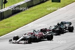Kimi Raikkonen (FIN) Alfa Romeo Racing C41 and Sebastian Vettel (GER) Aston Martin F1 Team AMR21 battle for position. 27.06.2021. Formula 1 World Championship, Rd 8, Steiermark Grand Prix, Spielberg, Austria, Race Day.