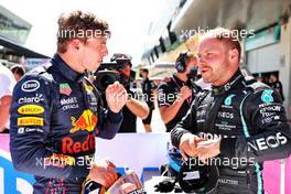 (L to R): pole sitter Max Verstappen (NLD) Red Bull Racing in qualifying parc ferme with Valtteri Bottas (FIN) Mercedes AMG F1. 26.06.2021. Formula 1 World Championship, Rd 8, Steiermark Grand Prix, Spielberg, Austria, Qualifying Day.