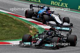 Lewis Hamilton (GBR) Mercedes AMG F1 W12 leads George Russell (GBR) Williams Racing FW43B. 26.06.2021. Formula 1 World Championship, Rd 8, Steiermark Grand Prix, Spielberg, Austria, Qualifying Day.