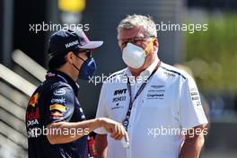 (L to R): Sergio Perez (MEX) Red Bull Racing with Otmar Szafnauer (USA) Aston Martin F1 Team Principal and CEO. 26.06.2021. Formula 1 World Championship, Rd 8, Steiermark Grand Prix, Spielberg, Austria, Qualifying Day.