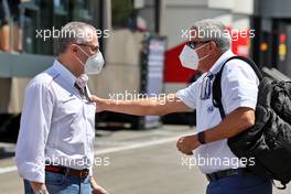 (L to R): Stefano Domenicali (ITA) Formula One President and CEO with Andrew Mallalieu (BDS) FIA Steward and President of The Barbados Motoring Federation. 27.06.2021. Formula 1 World Championship, Rd 8, Steiermark Grand Prix, Spielberg, Austria, Race Day.