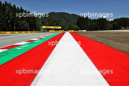 Circuit atmosphere - kerb and run off detail. 24.06.2021. Formula 1 World Championship, Rd 8, Steiermark Grand Prix, Spielberg, Austria, Preparation Day.
