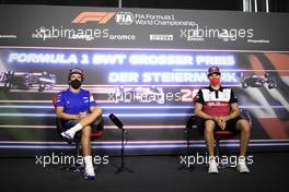 (L to R): Fernando Alonso (ESP) Alpine F1 Team and Antonio Giovinazzi (ITA) Alfa Romeo Racing in the FIA Press Conference. 24.06.2021. Formula 1 World Championship, Rd 8, Steiermark Grand Prix, Spielberg, Austria, Preparation Day.