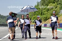 Yuki Tsunoda (JPN) AlphaTauri walks the circuit with the team. 24.06.2021. Formula 1 World Championship, Rd 8, Steiermark Grand Prix, Spielberg, Austria, Preparation Day.