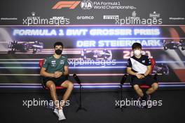 (L to R): Lance Stroll (CDN) Aston Martin F1 Team and Yuki Tsunoda (JPN) AlphaTauri in the FIA Press Conference. 24.06.2021. Formula 1 World Championship, Rd 8, Steiermark Grand Prix, Spielberg, Austria, Preparation Day.