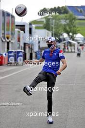 Esteban Ocon (FRA) Alpine F1 Team plays football in the paddock. 24.06.2021. Formula 1 World Championship, Rd 8, Steiermark Grand Prix, Spielberg, Austria, Preparation Day.