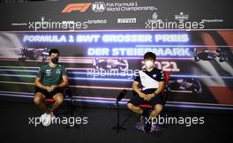(L to R): Lance Stroll (CDN) Aston Martin F1 Team and Yuki Tsunoda (JPN) AlphaTauri in the FIA Press Conference. 24.06.2021. Formula 1 World Championship, Rd 8, Steiermark Grand Prix, Spielberg, Austria, Preparation Day.