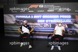 (L to R): Pierre Gasly (FRA) AlphaTauri and Valtteri Bottas (FIN) Mercedes AMG F1 in the FIA Press Conference. 24.06.2021. Formula 1 World Championship, Rd 8, Steiermark Grand Prix, Spielberg, Austria, Preparation Day.