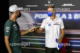 (L to R): Sebastian Vettel (GER) Aston Martin F1 Team and Mick Schumacher (GER) Haas F1 Team in the FIA Press Conference. 24.06.2021. Formula 1 World Championship, Rd 8, Steiermark Grand Prix, Spielberg, Austria, Preparation Day.
