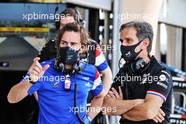 (L to R): Fernando Alonso (ESP) Alpine F1 Team with Davide Brivio (ITA) Alpine F1 Team Racing Director. 12.03.2021. Formula 1 Testing, Sakhir, Bahrain, Day One.