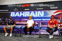 (L to R): Sergio Perez (MEX) Red Bull Racing; Lando Norris (GBR) McLaren; Carlos Sainz Jr (ESP) Ferrari, in the FIA Press Conference. 12.03.2021. Formula 1 Testing, Sakhir, Bahrain, Day One.