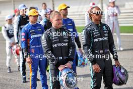 (L to R): Valtteri Bottas (FIN) Mercedes AMG F1 with Lewis Hamilton (GBR) Mercedes AMG F1. 12.03.2021. Formula 1 Testing, Sakhir, Bahrain, Day One.
