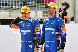 (L to R): Lando Norris (GBR) McLaren and Daniel Ricciardo (AUS) McLaren. 12.03.2021. Formula 1 Testing, Sakhir, Bahrain, Day One.