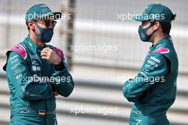 (L to R): Sebastian Vettel (GER) Aston Martin F1 Team with Lance Stroll (CDN) Aston Martin F1 Team. 12.03.2021. Formula 1 Testing, Sakhir, Bahrain, Day One.