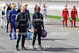 Valtteri Bottas (FIN) Mercedes AMG F1 with team mate Lewis Hamilton (GBR) Mercedes AMG F1. 12.03.2021. Formula 1 Testing, Sakhir, Bahrain, Day One.
